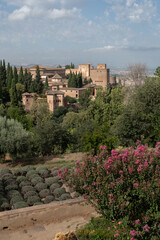 Views of the orchards, the Alhambra and the Albaicin from the Acequia patio in the Almunia Palace in the Generalife