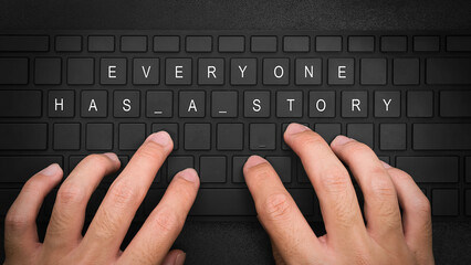 everyone has a story. Hand typing on desktop office computer keyboard. Writer typing on a computer...