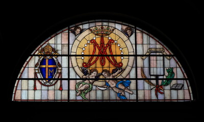 San Lorenzo in Lucina Church Stained Glass Window Close Up in Rome, Italy