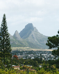 Panoramic and fantastic view of Curepipe and the Three Mammals Mountains Mauritius. Balcony of trou aux cerfs, deer hole. Opposite is part of the Mauritian city or village.