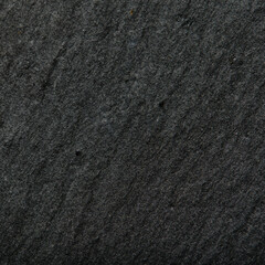 Gray texture of slate stone in macro photo.