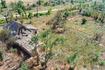 An aerial view of a destroyed village in the countryside after a battle. War in Ukraine