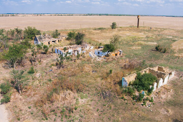 An aerial view of a destroyed village in the countryside after a battle. War in Ukraine