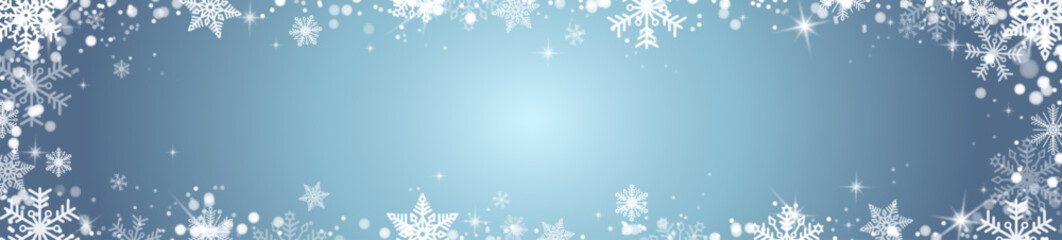Falling snowflakes on a blue gradient background. A magical Christmas background of snowflakes and sparkles. Vector EPS 10.