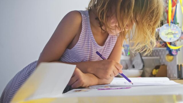 Young Caucasian Girl Doing Homework for Elementary School