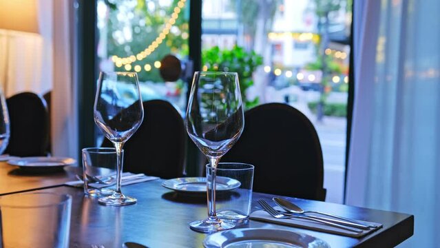 Tableware and Wine Glasses Set for Dinner in Tiny Cosy French Style Restaurant