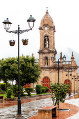 Obraz premium Beautiful central square and the San Jeronimo Parish Temple of the small town of Nobsa well known for the traditional handmade ruanas in the region of Boyaca in Colombia