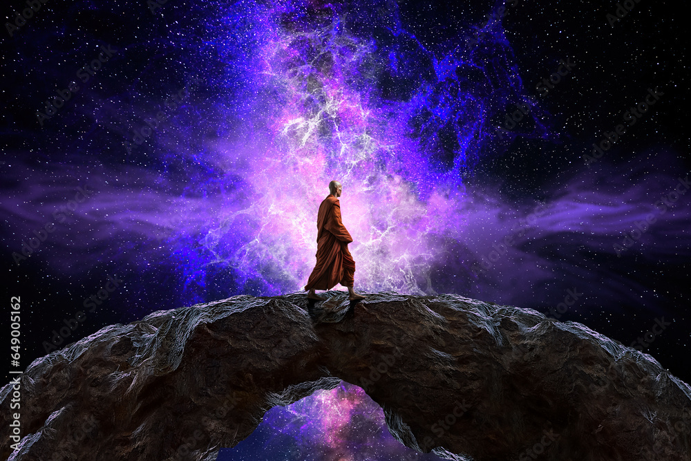 Wall mural buddhist monk looking at the universe