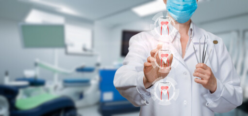 Doctor Dentist clicks on a cured tooth on a virtual screen.