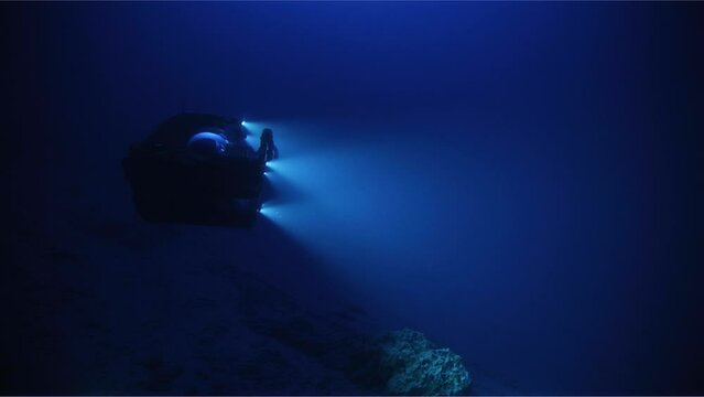 Submarine Exploring Dark Ocean Floor