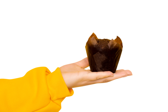 Female hand with a chocolate muffin on a transparent background - Powered by Adobe