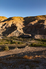 rocky and arid formation in the Camarones valley, town of Illapata