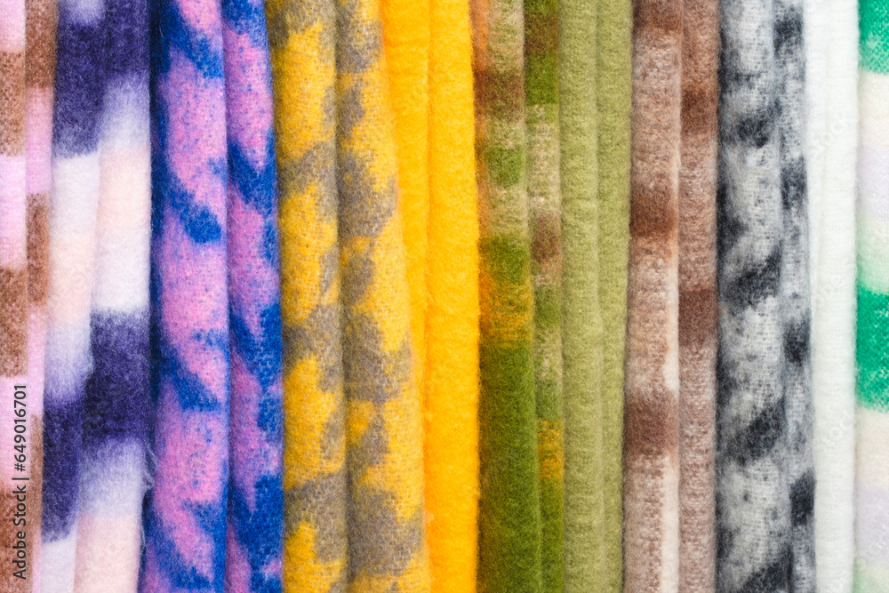 Aufkleber mix colorful hanging vertical stripe textile, fabrics, cloths on the rack. texture of multicolored f