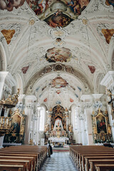 Fototapeta na wymiar Fulpmes, Austria - August 15, 2023: Interior of the Catholic Parish Church of St. Vitus