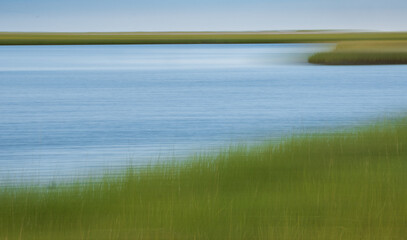Creative abstract coastal scene of tidal flats at low tide