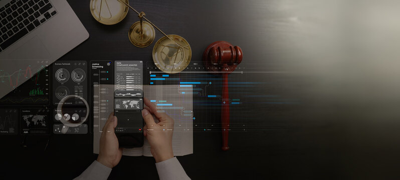  Law and justice concept. Judge using smartphone for jusice data analysis business law,Judge hammer with the dollar placed - concept of judgment and justice. About fraud tax fines