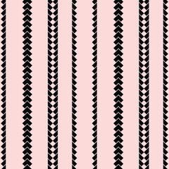 A black and white border patterns on a pink background
