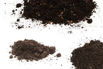 A handful of earth isolated on white background.