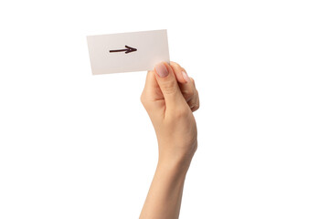 Arrow sign on a card in a woman hand isolated.