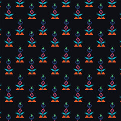 A vibrant floral repeated seamless pattern on a blue background
