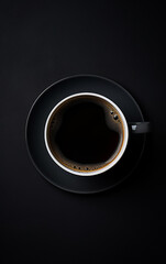 Obraz na płótnie Canvas Black cup of coffee on black background. Top view