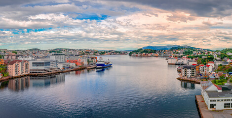 Panorama of Kristiansund, Norway, seen from Sorsund Bridge. Kirkelandet is on the left and Innlandet on the right.