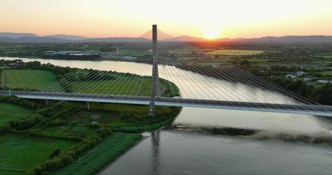 Massive bridge over the Suir River against the sunset 4k