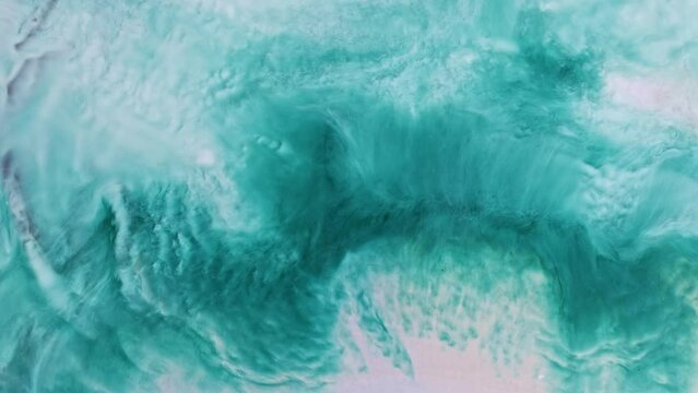 Fluid art. Abstract background with effect sea waves. Backdrop similar to the landscape of the ocean. Liquid artistic texture motion with turquoise and white colors.