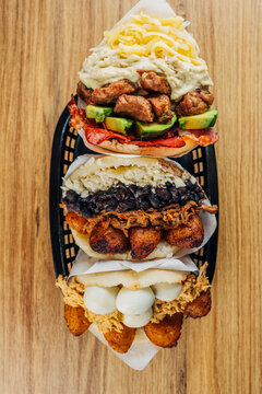 Venezuelan food on a table, arepas, tostones, cachapas, empanadas. typical Venezuelan gastronomy