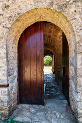 Fototapeta na wymiar Entry of the monastery complex of Andromonastiro in Peloponnese, Greece