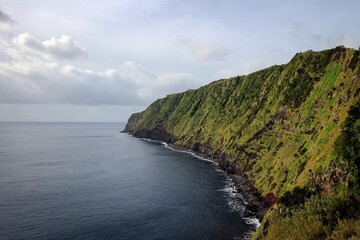 Scenic Atlantic ocean coast near Ponta do Arnel lighthouse, Nordeste town, Sao Miguel island, Azores, Portugal