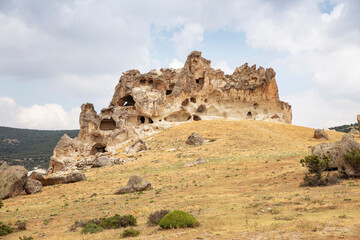 Historical ancient Frig (Phrygia, Gordion) Valley. Tomb (shrine, turbe) and old cemetery. Frig Valley is popular tourist attraction in the Yazilikaya, Afyon - Turkey.