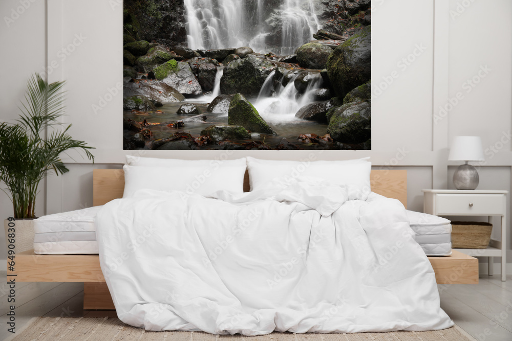 Wall mural Light bedroom. Interior with comfortable bed and mountain landscape wallpapers