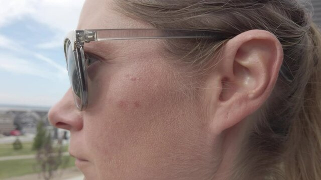 Close up of female face and ear