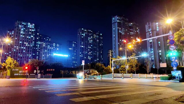 Time lapse photography of streets, cars and buildings in Chinese cities at night
