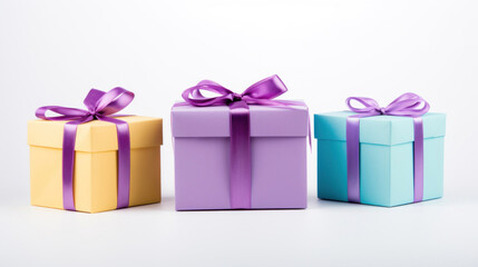 Obraz premium Gift boxes with ribbon and bow on white background