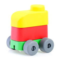 Plastic children's constructor-a steam train, isolated on a white background. Colorful toy train. Educational games for children. Construction and stacking
