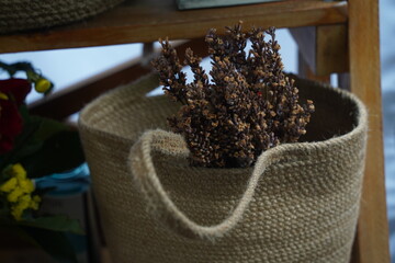 Bunches of dried lavender in a knitted basket.