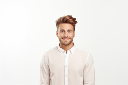 Picture of man wearing white shirt with genuine smile. Suitable for various professional and personal contexts.