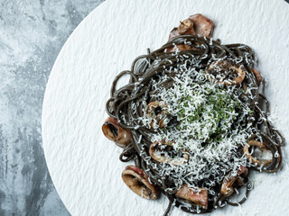 Squid ink pasta with cheese