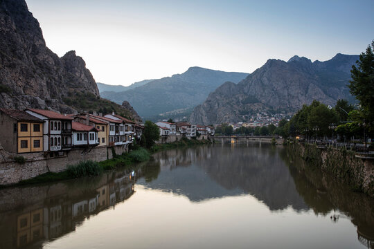 Amasya,TURKEY old riverside Turkish(ottoman) city buildings and its reflection on water,sunny summer day.Amasya is city of princes of ottoman. ottoman Princes were educated in Amasya