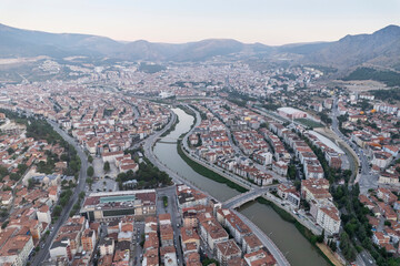 Amasya,TURKEY old riverside Turkish(ottoman) city buildings and its reflection on water,sunny summer day.Amasya is city of princes of ottoman. ottoman Princes were educated in Amasya