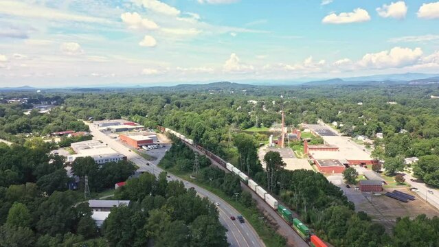 Train moving along the tracks in Easley, South Carolina. Cinematic shot.