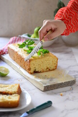 English lemon cake, light background decorated with mint leaves