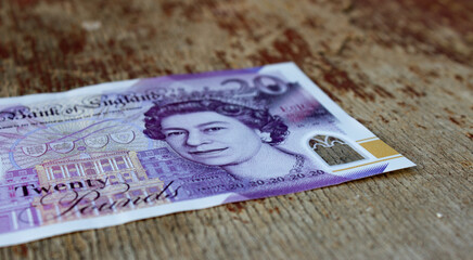 Twenty pounds close up. The national currency of Great Britain - obrazy, fototapety, plakaty