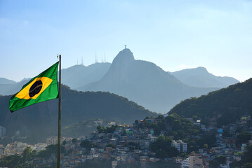 The Brazilian Flag, the Corcovado Mountain and the Favela in Morro da Babilônia, seen from Forte Duque de Caxias (Forte do Leme) - Rio de Janeiro, Bra