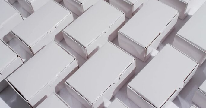 Video of cardboard boxes with copy space over white background