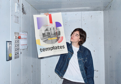 Mockup of woman holding customizable A2 vertical poster in elevator, camera flash