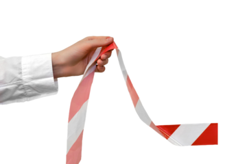 Removing the restraining tape from the office, isolated on a white background. Concept of ending the quarantine and isolation from the coronavirus epidemic