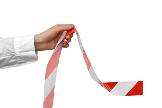 Removing the restraining tape from the office, isolated on a white background. Concept of ending the quarantine and isolation from the coronavirus epidemic